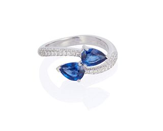 A sapphire and diamond crossover ring