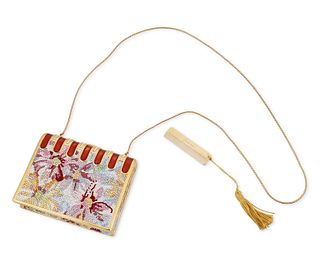 A Judith Leiber purse with comb
