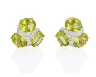 A pair of peridot and diamond ear clips