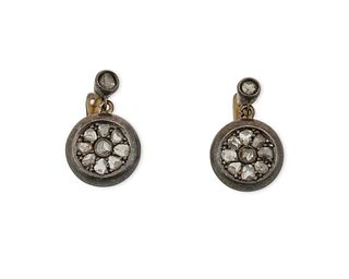 A pair of antique diamond earrings