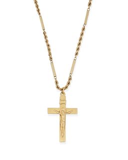 A gold cross pendant necklace