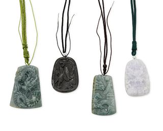 Four carved jade pendants