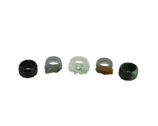Five carved jade rings