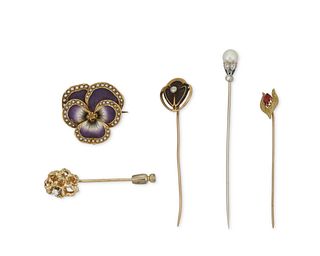 A group of antique and vintage pins