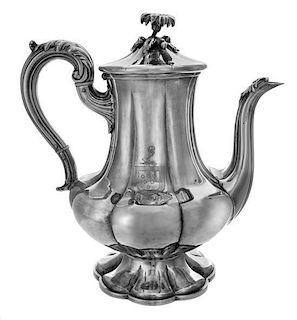 An Irish Victorian Silver Teapot, Maker's Mark HL, Possibly Henry Lazarus, Dublin, 1868, having a floral finial and an acanthus
