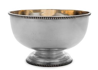 A Victorian Silver Center Bowl, Elkington & Co. Ltd, London, 1896, having a gadrooned rim and a foot with a gilt interior.
