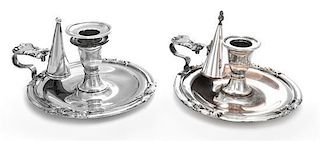 * A Pair English Silver-Plate Chambersticks, 19th Century, each border spaced at four intervals with foliate ornaments.