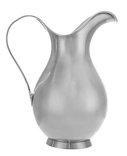 A Danish Silver Pitcher, Kay Fisker for A. Michelsen, Copenhagen, of baluster form, raised on a flared foot.