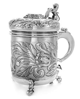 A Danish Silver Tankard, Johannes Siggaard, Copenhagen, Mid-20th Century, of cylindrical form, the body with repousse floral and