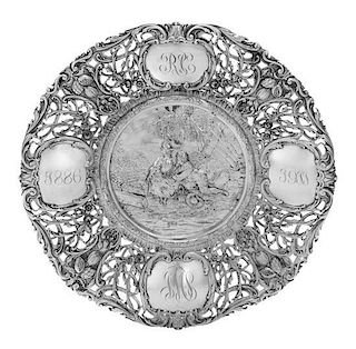 A German Silver Pierced and Repousse Commemorative Tray, George Roth & Co., Hanau, worked to show floral, foliate and berry deco
