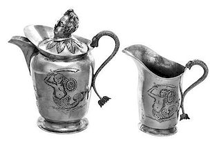 Two Polish Silver Creamers, 18th Century, the larger example lidded and having a finial in the form of a putto's head, both engr