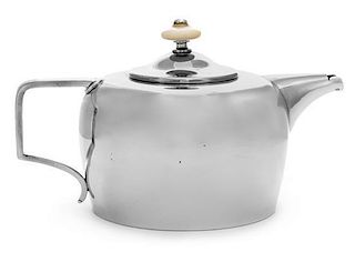 * A Russian Silver Teapot, , of cylindrical form, having a rounded top and a squared handle, bearing two second kokoshnik marks