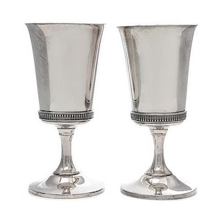 A Pair of Silvered Metal Goblets Height 7 3/8 inches.