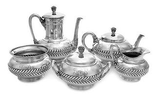 An American Silver Five-Piece Tea and Coffee Service, Tiffany & Co., New York, NY, 1870, each with a continuous laurel band alon