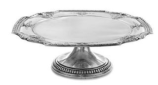 An American Silver Cake Tray, Tiffany & Co., New York, NY, Early 20th Century, the rim having floral and ribbon decoration, the