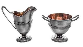 An American Silver Creamer and Footed Bowl, Tiffany & Co., New York, NY, each having a foliate decorated band along the body and