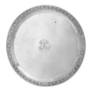 An American Silver Salver, Tiffany & Co., New York, NY, 1880, of circular form, with a foliate scroll border and a script monogr