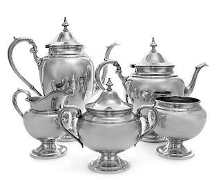 An American Silver Coffee and Tea Service, Gorham Mfg. Co., Providence, RI, in the Puritan pattern, comprising a coffee pot, a t