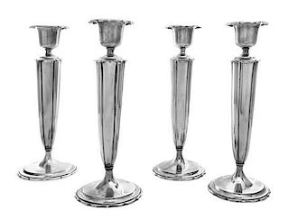 An Assembled Set of Four American Silver Candlesticks, Richard Dimes Co., South Boston, MA, engraved Etta and Clarence 1909-1934