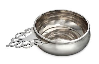 An American Silver Porringer, Currier & Roby, New York, NY, having a pierce decorated handle.