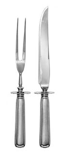 An American Sterling Silver Carving Set, , the fork and knife having scroll decoration to the handles.