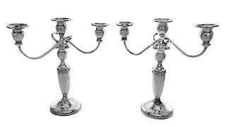 A Pair of American Silver Three-Light Candelabra, Mueck-Carey Co., New York, NY, each having baluster form candle cups with serp