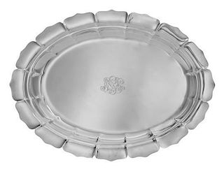 An American Silver Bowl, Reed & Barton, Taunton, MA, of oval form, having a scallped border and centered with the engraved monog