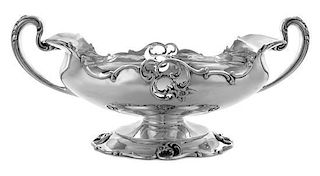 An American Silver Center Bowl, Smith, Patterson & Co., Boston, MA, of oval form with two foliate decorated handles, the body an