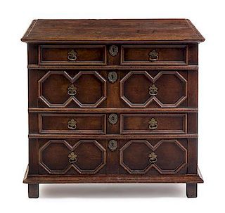 A William and Mary Oak Chest of Drawers Height 32 3/4 x width 36 1/4 x depth 22 3/4 inches.