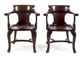 A Pair of English Mahogany Horseshoe Back Armchairs Height 33 1/2 inches.