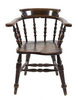 An English Yew Wood Captain's Chair Height 32 1/2 inches.