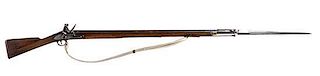 * A British Third Model Brown Bess Flintlock Musket and Bayonet Overall length 57 inches; barrel length 39 inches.