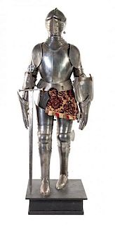 * A Medieval Style Suit of Armor Height 75 1/2 inches.