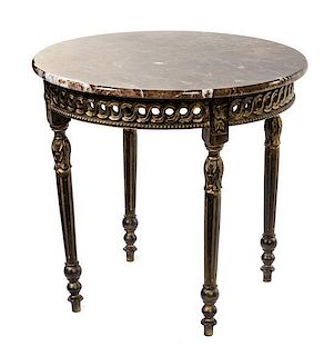 A Louis XVI Style Occasional Table Height 25 3/4 x diameter 28 inches.