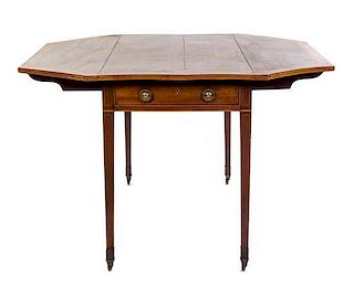 A George III Style Walnut Pembroke Table Height 27 3/4 x width 32 3/4 x depth 20 3/4 inches (closed).