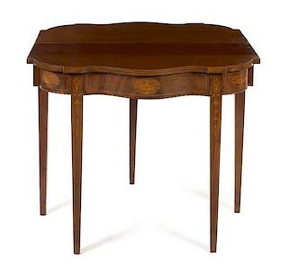 A Hepplewhite Style Marquetry Mahogany Flip-Top Games Table Height 30 x width 34 inches.