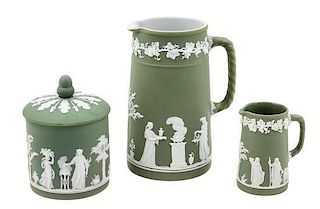 A Group of Three Wedgwood Jasperware Table Articles Height of tallest pitcher 8 1/4 inches.