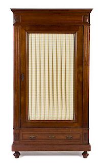 A Victorian Mahogany Armoire Height 79 3/4 x width 44 x depth 21 inches.