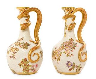 A Pair of Royal Worcester Porcelain Ewers Height 11 1/2 inches.