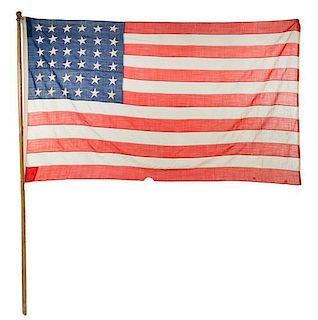 An American Flag 90 x 52 inches.
