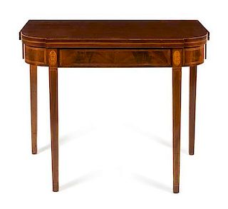 A Federal Style Fruitwood Inlaid Mahogany Flip Top Games Table Height 31 x width 38 inches.