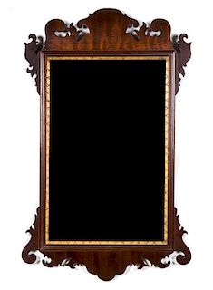 An American George III Style Parcel Gilt Mahogany Mirror 36 x 22 inches.