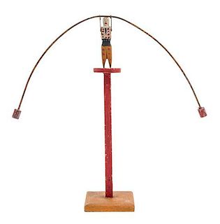 An American Wood and Metal Balancing Toy Height overall 13 3/4 inches.