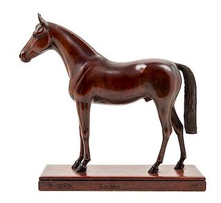 * A Carved Wood Figure of a Thoroughbred Horse Height 11 3/4 inches.