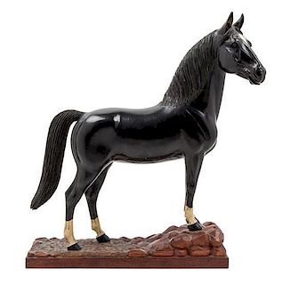 * A Carved and Painted Wood Figure of a Horse Height 13 1/2 inches.