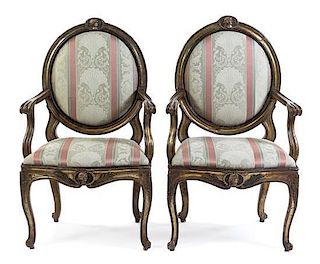 A Pair of Louis XV Style Giltwood Fauteuils Height 41 1/4 inches.