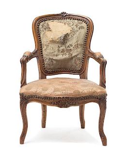 A Louis XV Style Diminutive Fauteuil Height 18 inches.