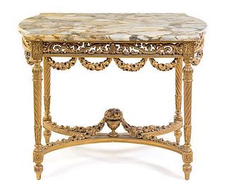 * A Louis XVI Style Giltwood Center Table Height 30 x width 39 1/2 x depth 24 inches.