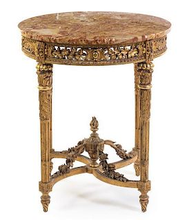 * A Louis XVI Style Giltwood Gueridon Height 32 3/4 x depth of top 28 1/2 inches.