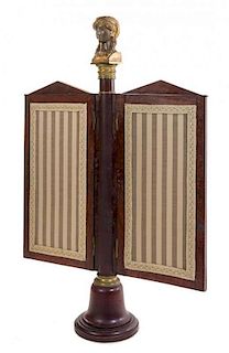 * An Empire Gilt Bronze Mounted Mahogany Two-Panel Fire Screen Height 47 1/3 inches.